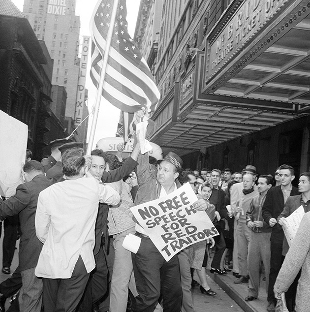 Police disperse anti-Castro demonstrators in New York’s Times Square area, Sept. 15, 1963. Demonstrators, carrying placards and American flags, were protesting a nearby rally by students who returned from an unauthorized visit to Cuba.