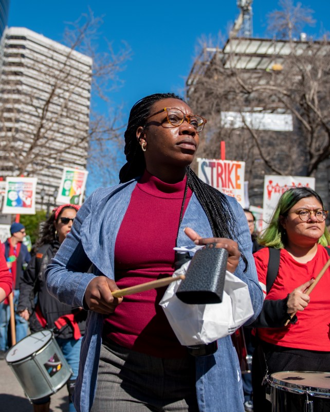 Members of community music group BoomShake joined the rally.