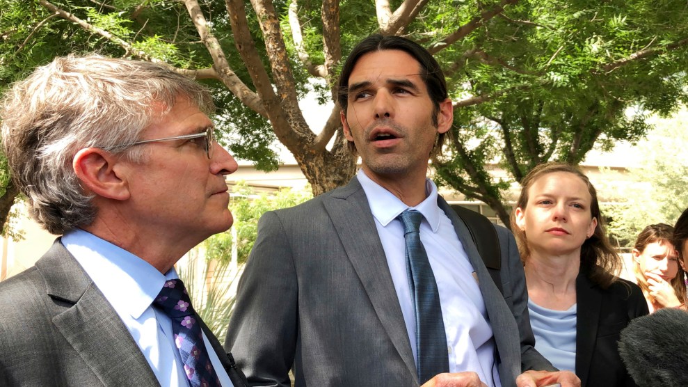 Scott Warren (center) speaks after his high-profile court case ends in a mistrial.