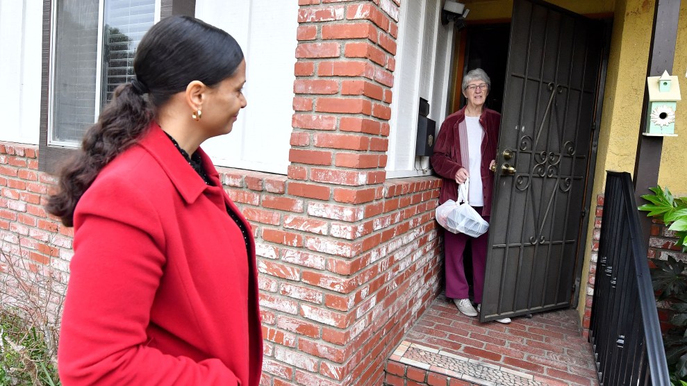 A woman delivers meals oh wheels meal