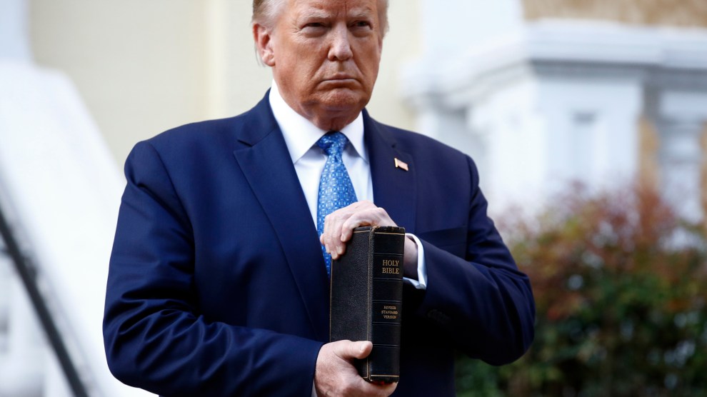 Trump holds a bible outside St. John's Episcopal Church