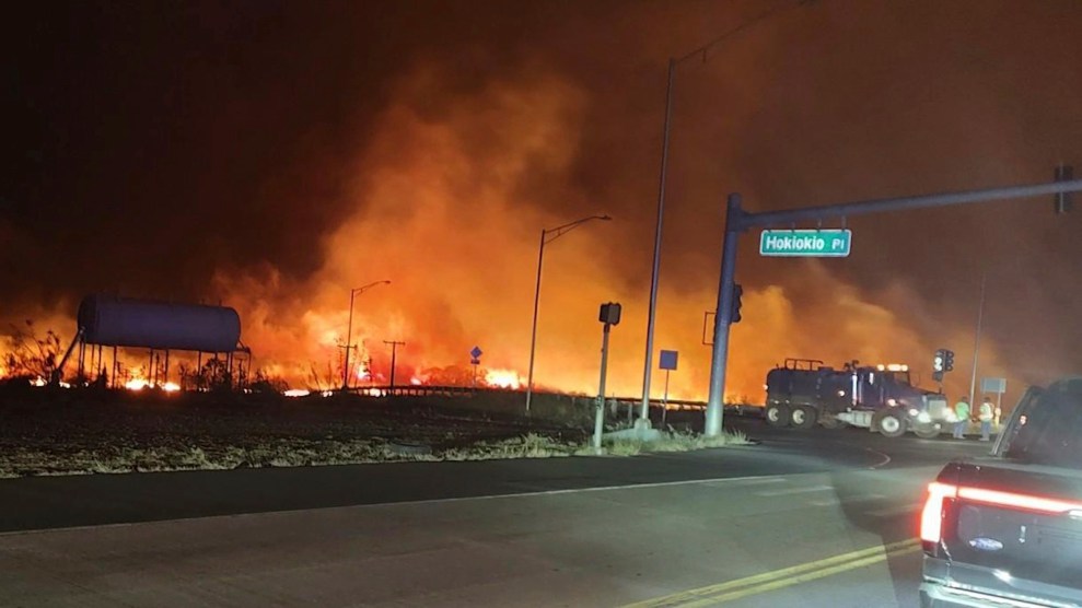 This photo provided by County of Maui shows fire and smoke filling the sky from wildfires on the intersection at Hokiokio Place and Lahaina Bypass in Maui, Hawaii on Tuesday, Aug. 8, 2023.