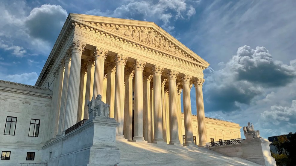 Front of the US Supreme Court building, with cloudy skies in the background