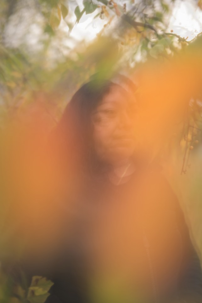 Kary poses for a portrait in the park near her home in the Bronx. 