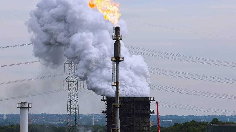 Smoke and fire flaring out of a plant