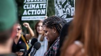 U.S. House Representative Cori Bush surrounded by supporters of the American Climate Corps at a press conference in 2023.