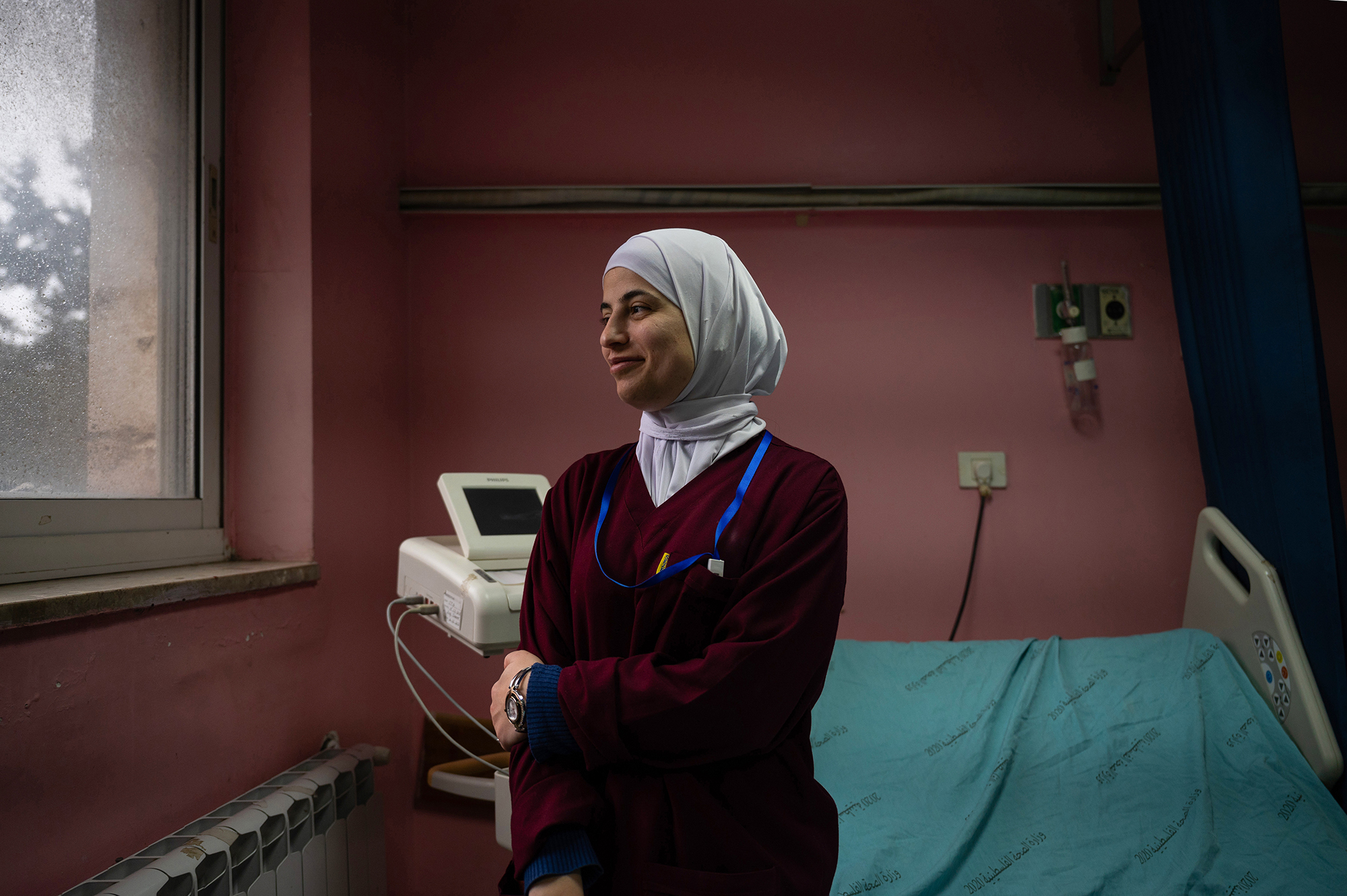 Portrait of a woman in a hospital room.