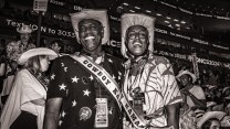 Two people wearing cowboy hats standing at the DNC