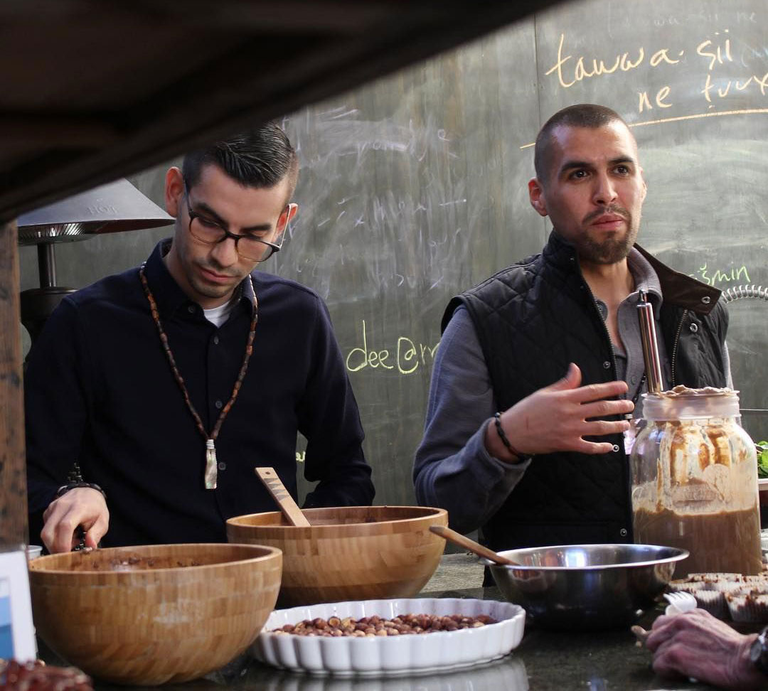 cafe-ohlone-founders-behind-bowls-of-food