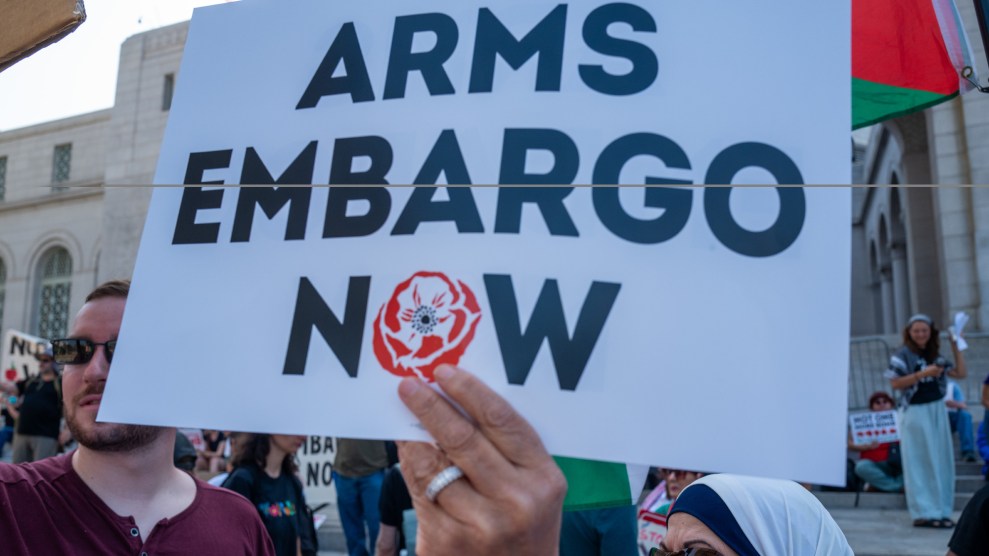 sign reading "arms embargo now"