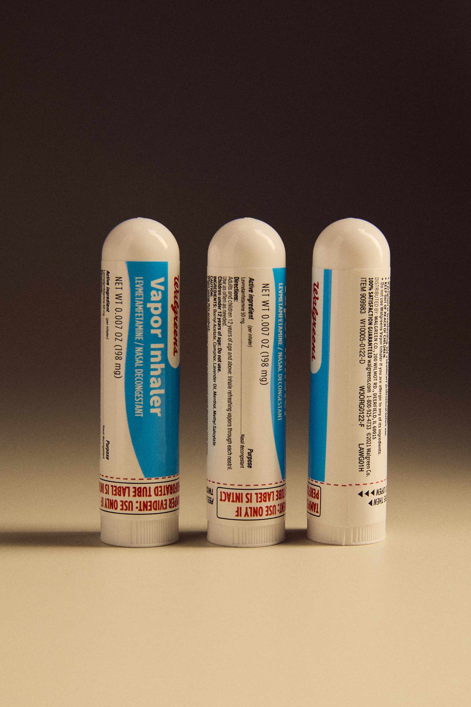 A studio shot of three Walgreens vapor inhalers.