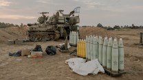 An IDF tank with mortars prominently displayed.