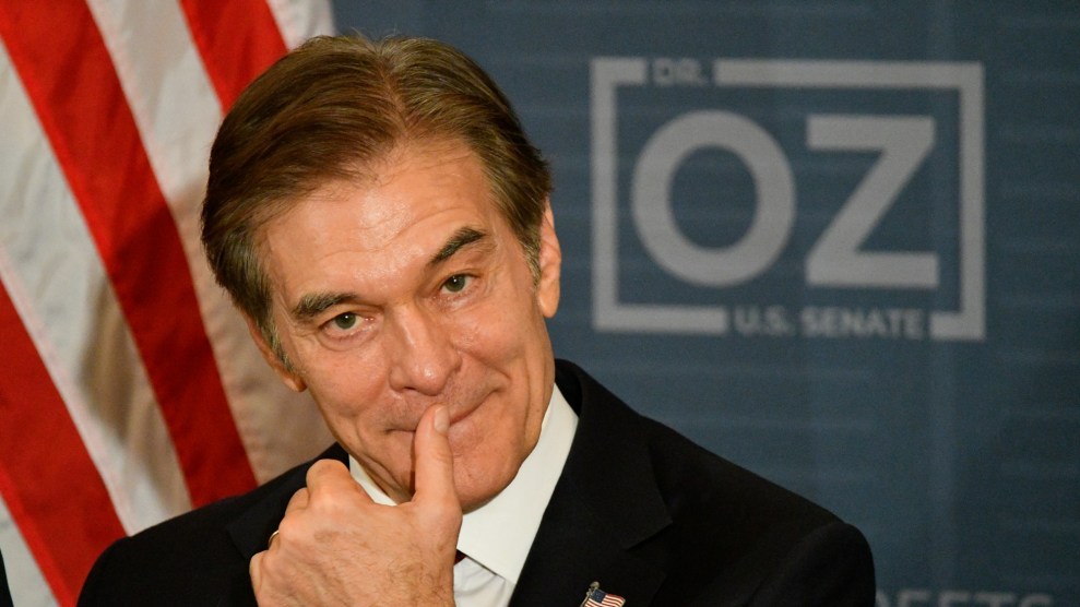 Dr. Oz with his thumb on his mouth