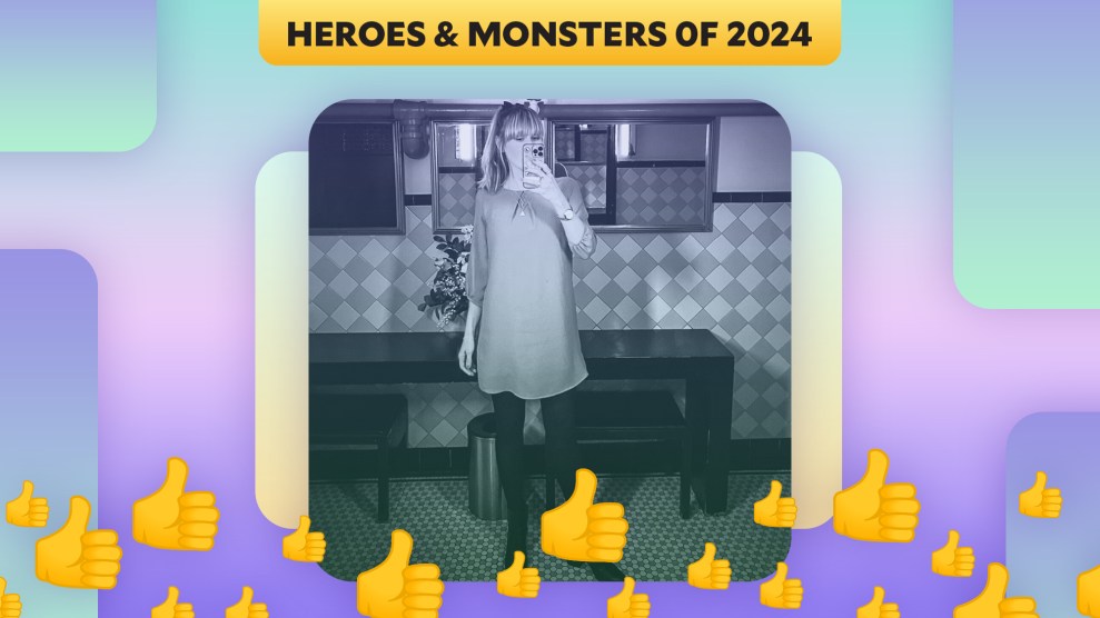 A blue-tinted image of a woman taking a mirror selfie, with thumbs-up emojis layered on top.