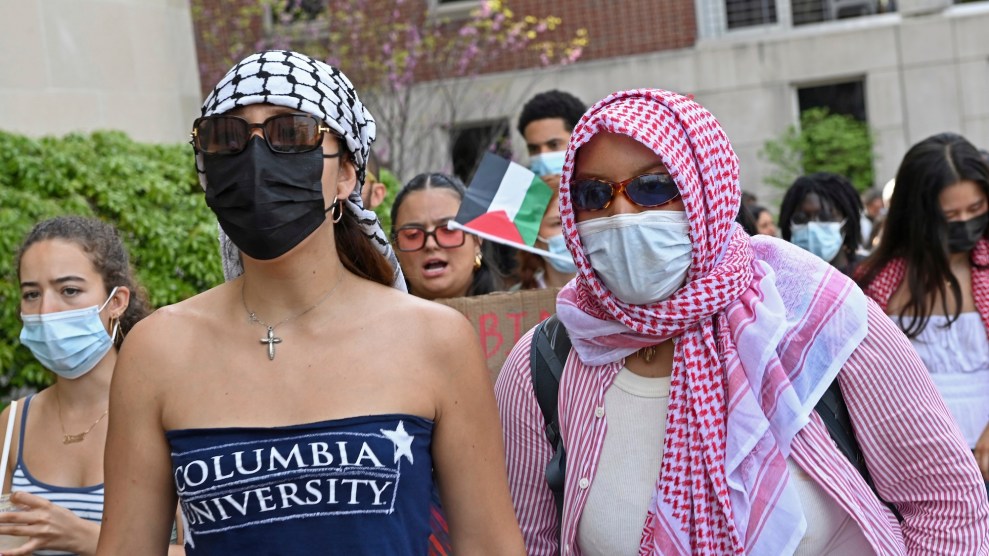 Students in a crowd wearing masks
