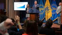 Robert F. Kennedy Jr. stands at a podium during a press conference on autism rates.