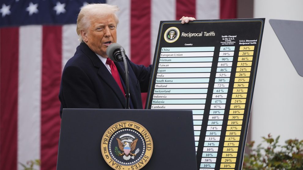 Trump holding poster at White House