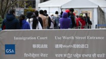 Immigrants assemble for their court dates.