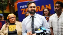 Zohran Mamdani speaking at a rally to supporters