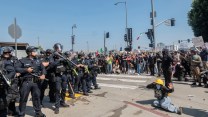 Protests in the streets of downtown LA escalated Sunday afternoon following the deployment of National Guard troops.