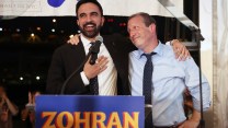 Zohran Mamdani and Brad Lander stand on a stage.
