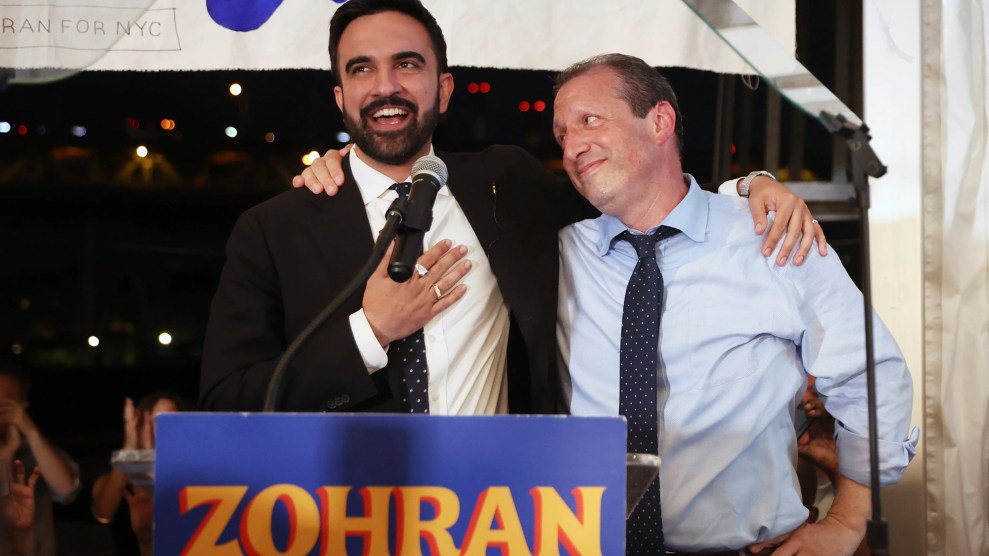 Zohran Mamdani and Brad Lander stand on a stage.