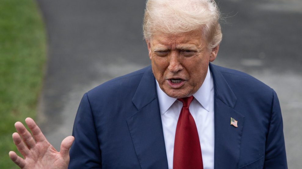 Photo of President Trump speaking to reporters; Trump and his cronies insist Trump's firing of the BLS commissioner over disappointing jobs data was justified.