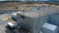 Aerial view of grey building that says Electra