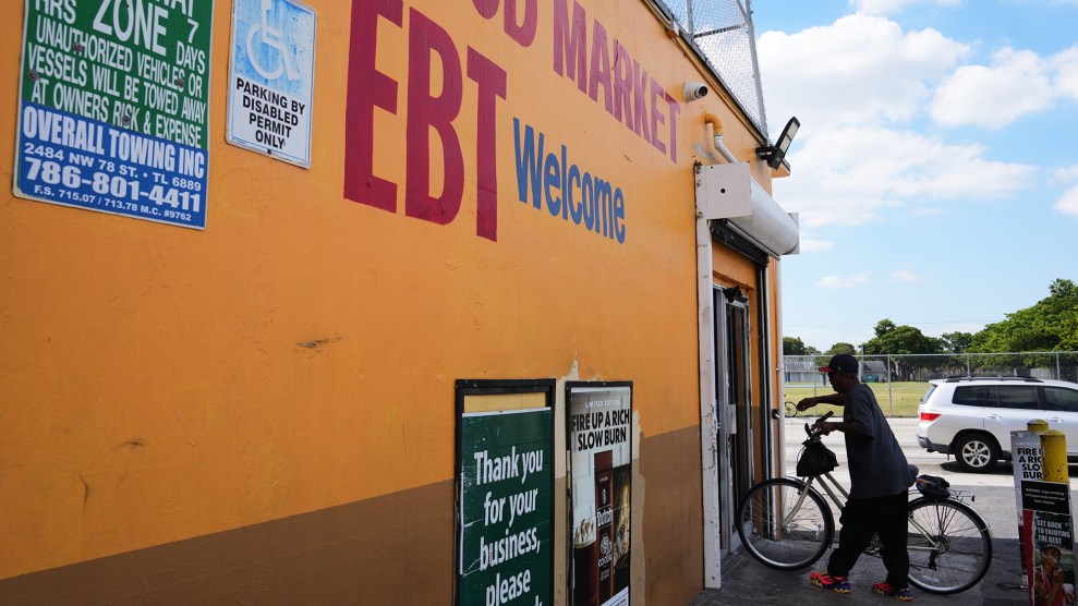 A customer enters the Friend's Meat Market and Grocery, an orange building with "EBT Welcome" written on the side.