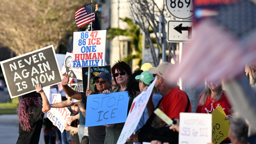Protestors in Coral Springs, Florida attend an anti-ICE demonstration on January 9, 2026. They hold signs that read "STOP ICE," NEVER AGAIN IS NOW," among others.