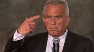 RFK Jr pointing at his head