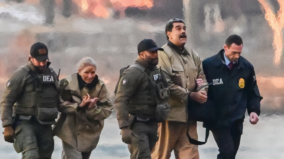 A middle-aged man and woman wearing heavy brown coats, their wrists handcuffed, are led by three men in dark tactical gear that’s labeled “DEA” across their chests.