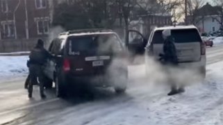 Screen grab from a bystander video of the shooting, a split second after the deadly shot was fired.
