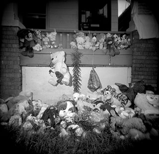 A makeshift memorial on Aiyana's porch.
