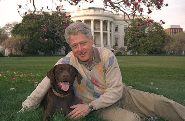 President Clinton with his dog Buddy in front of the White House.