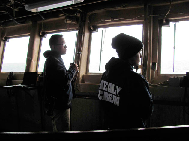 Donglai Gong watches the glider launch from the Healy Bridge.  Julia Whitty.]